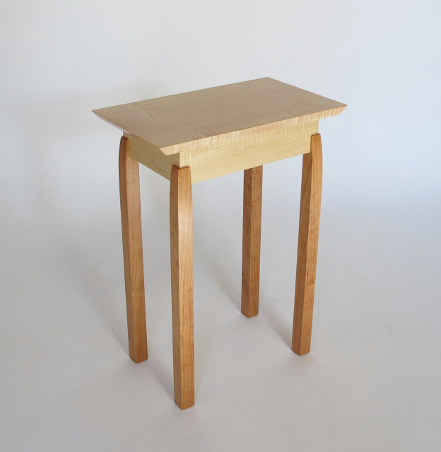 Exposed Leg End Table by Mokuzai Furniture- a small narrow end table with unique joinery details- a solid wood accent table in tiger maple and cherry- handmade in the USA